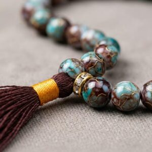 Close up of brown marble finish tasbeeh beads mixed pattern