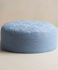 Side profile of light blue Islamic kufi cap showing hard structured material