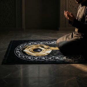 Man praying Salah on black premium quality prayer mat