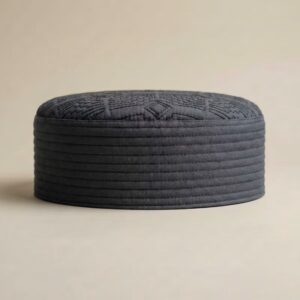 Side profile of charcoal grey Islamic cap showing hard structured material